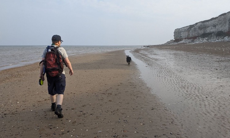 Climate Policy Radar's Peter Hooper walking his dog